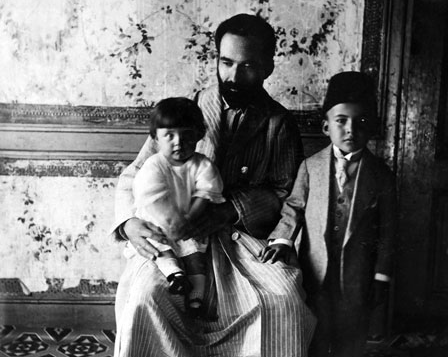 At age six, with his father Mehmet Necati Bey and sister Sabahat, 1922.